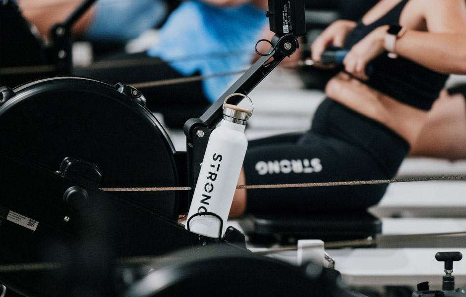 STRONG water bottle resting on a Rowformer